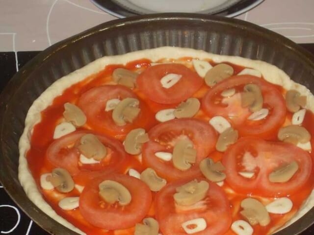 Pizza with Ham and Champignons Photo 9