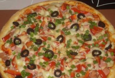 Pizza with Ham and Champignons Photo 1