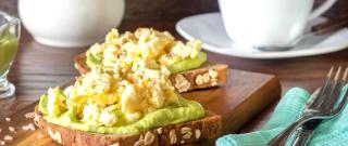 Toasts with Avocado and Scrambled Eggs Photo