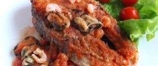 Salmon in the Tomato Sauce with Shrimps and Mussels Photo