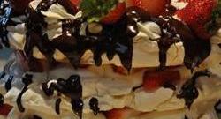Meringue Cake with Whipped Cream and Raspberries Photo