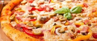 Secrets of Cooking Delicious Pizza Photo