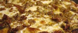 Pizza with Smoked Mozzarella, Sausage and Pesto Sauce Photo